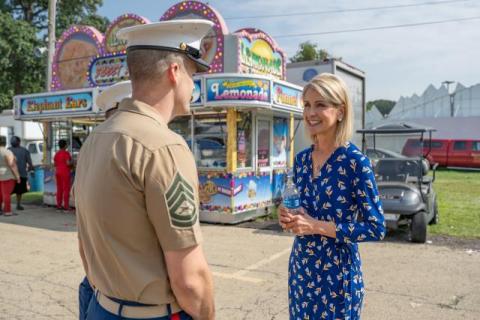 Miller talking with a service member